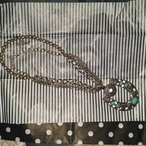 Gorgeous turquoise horseshoe adjustable necklace w tiny rhinestones.